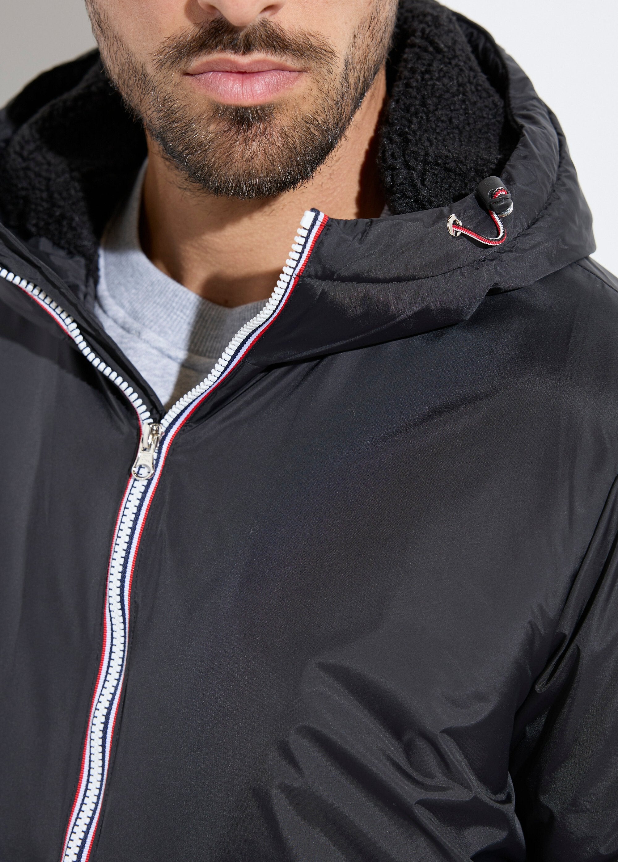 Short,_warm,_water-repellent_parka_Black_DE1_slim